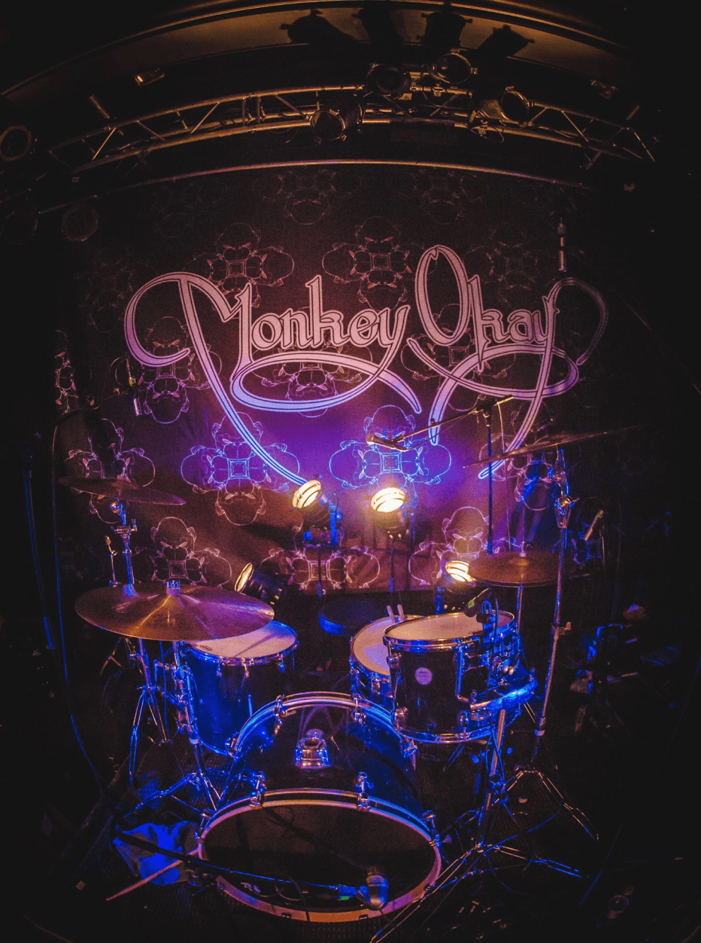 Drum kit in front of Monkey Okay stage type